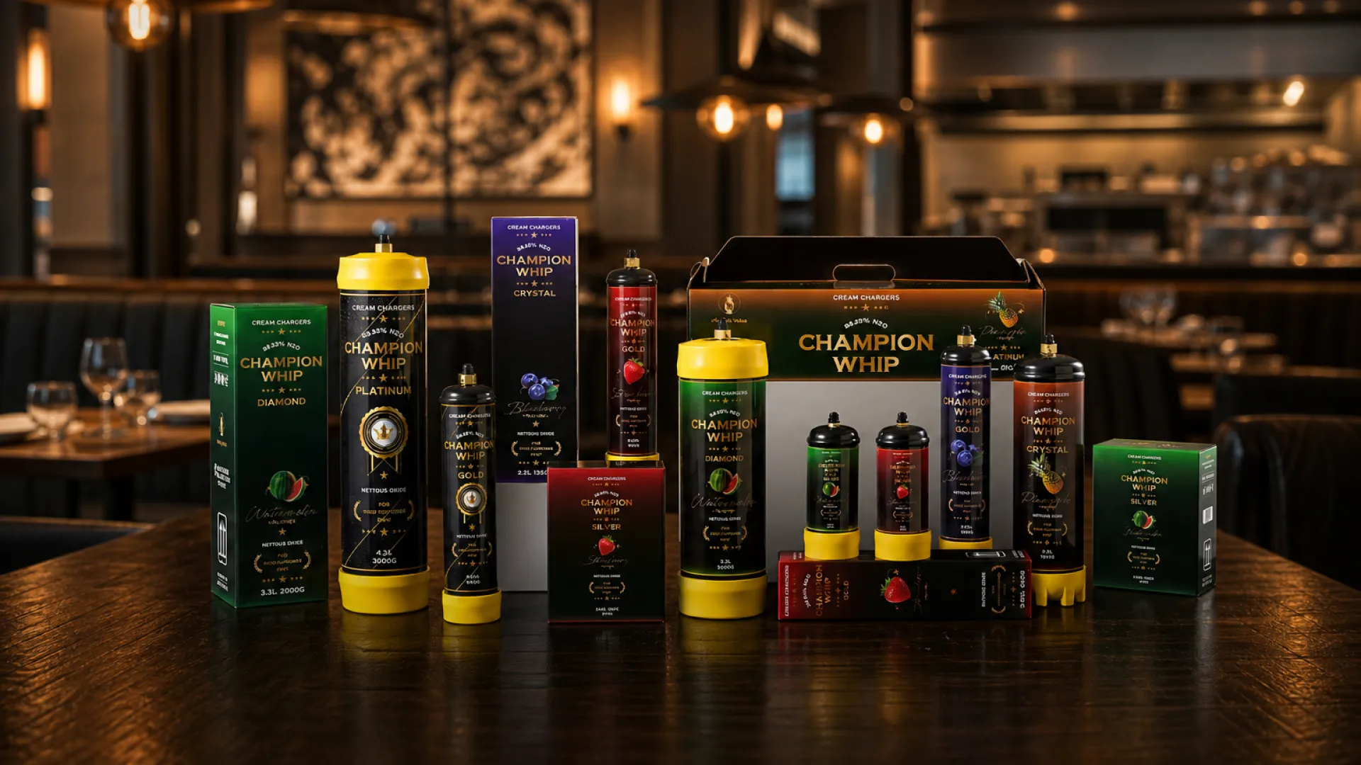 Assorted flavored N2O cylinders in fruit colors lined up on a commercial kitchen counter